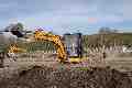 Pat and Emily on a digger