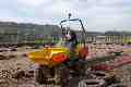 Tony and Emily on a dumper truck