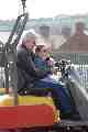 Tony and Emily on a dumper truck