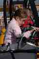 Emily on a digger
