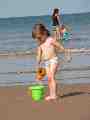 Emily fills her bucket